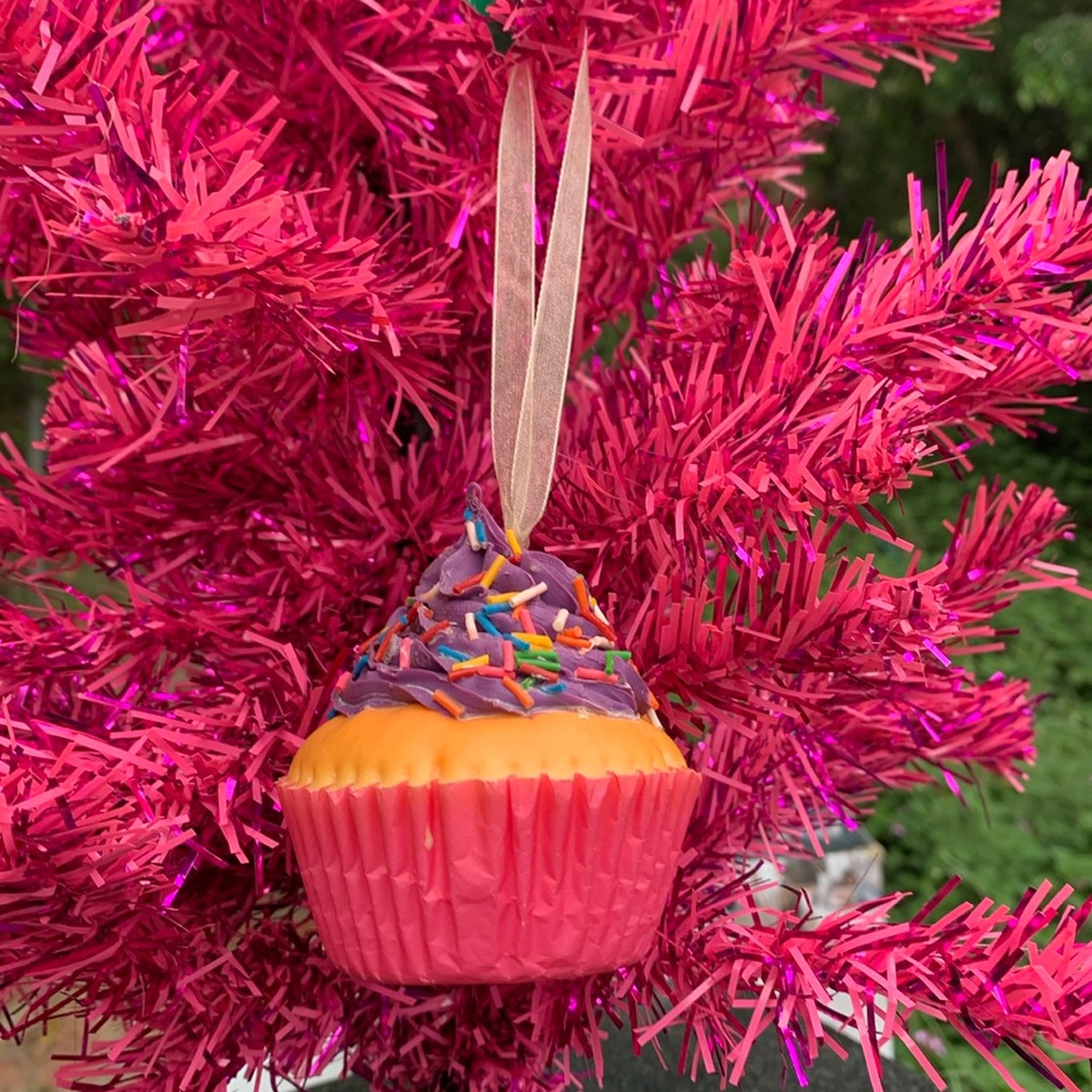 Kurt Adler lifelike purple frosted cupcake with sprinkles. Spongy texture.
